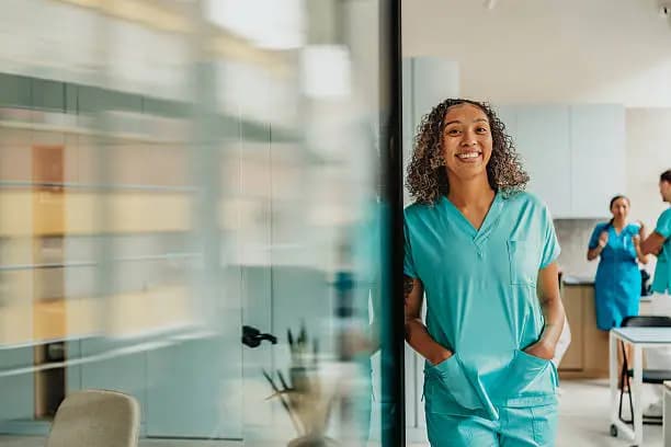 Clinician in scrubs at a Canadian clinic
